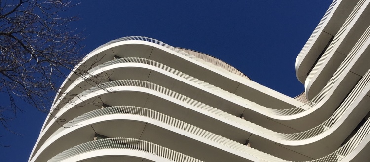 Balconies made of white cement characterize new appearance